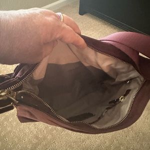 Tumi nylon purse in great shape. Lots of pockets and room
